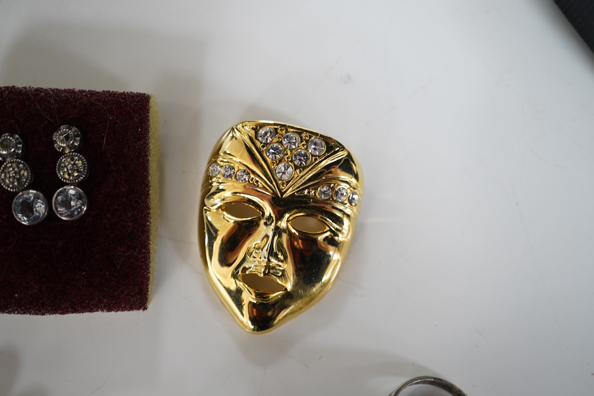 A collection of jewels, comprising: an opal and sapphire cluster ring and a citrine ring in 9ct gold, each with British hallmarks, combined gross weight approximately 4 grams; together with a pair of blue topaz and marca